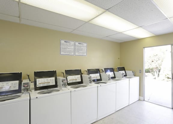 Laundry facility at Villa Pacific Apartments in Oceanside, California.
