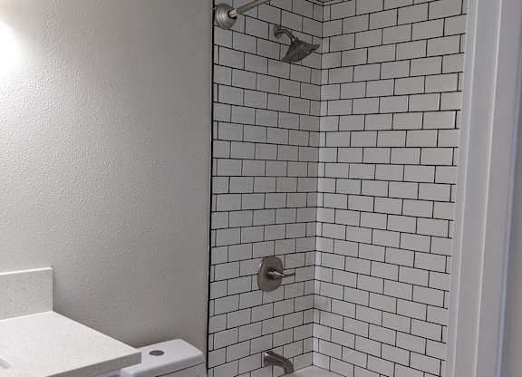 Nice white bathroom at The Hardison Apartments in Pasadena, California.