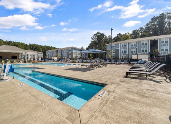 our apartments have a resort style pool with lounge chairs