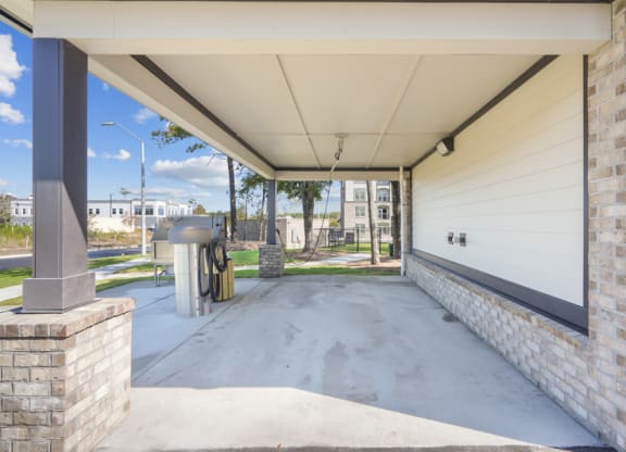 the preserve at ballantyne commons spacious covered parking area with brick walls and concrete