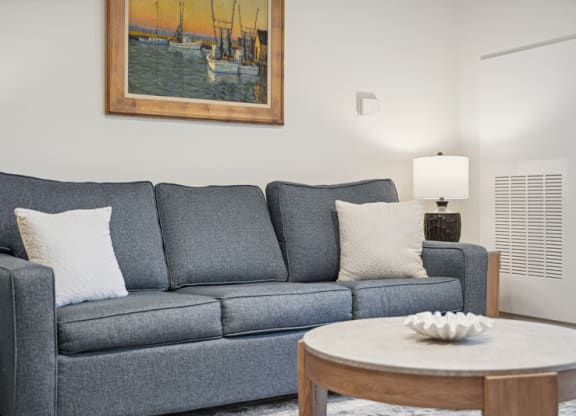 a living room with a couch and a coffee table