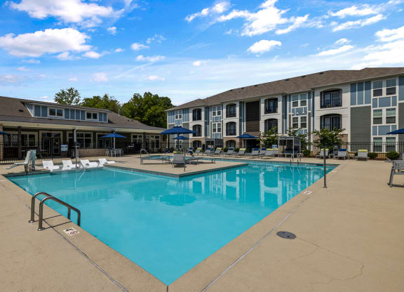 Swimming pool with poolchairs