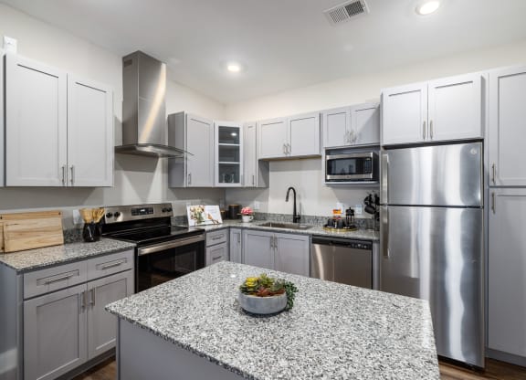 Granite countertops and grey cabinets