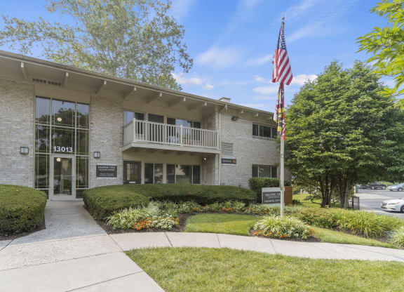 a building with an american flag in front of it