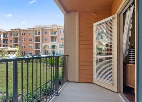the outlook of a balcony at the preserve at polk apartments