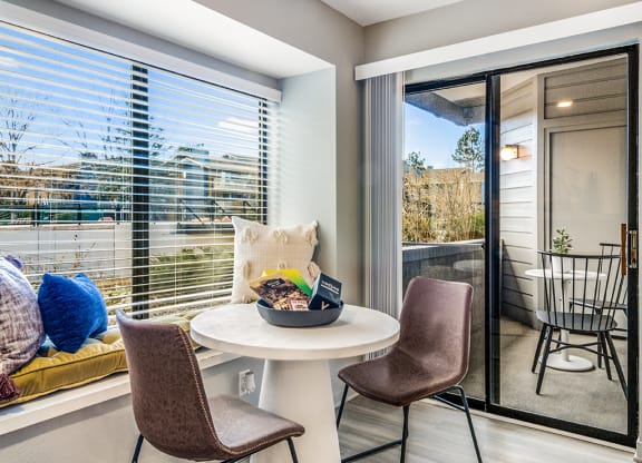 a living room with a table with a bowl of food on it