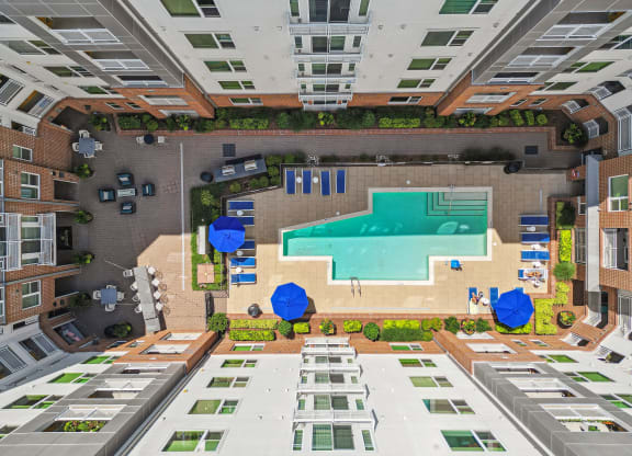 an overhead view of a swimming pool in the middle of a building