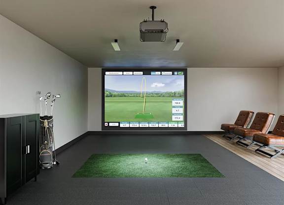 Indoor golf simulator with projection screen at Garden at 3Roots Apartments, San Diego