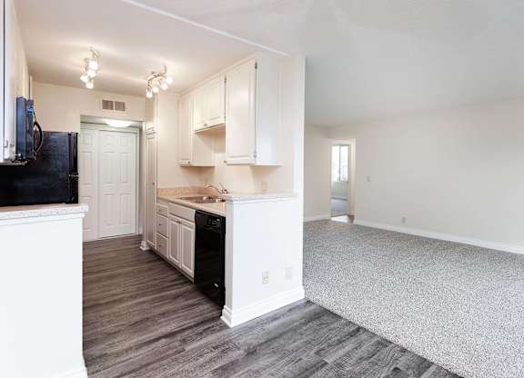 Kitchen with White Cabinets at Burbank Gardens Apartments, Sherman Oaks, California