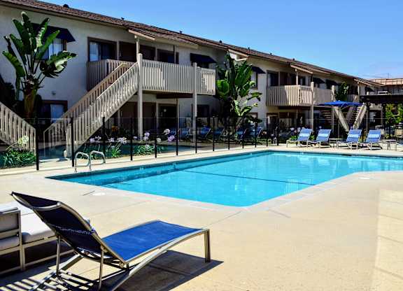 Pool With Lounge Chairs at La Jolla Canyon Apartments, San Diego, 92121