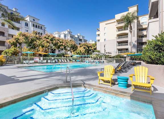 Resort style pool and spa with lounge seating at La Jolla Crossroads Apartments, San Diego, CA 92122