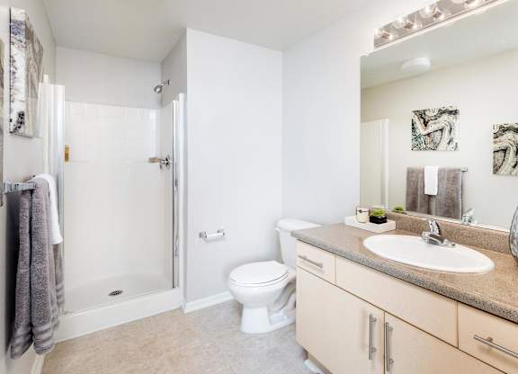Bathroom with walk in shower and vanity at La Jolla Crossroads Apartments, San Diego, 92122
