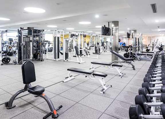 Spacious fitness center with cardio and weight equipment at La Jolla Crossroads Apartments, California, 92122