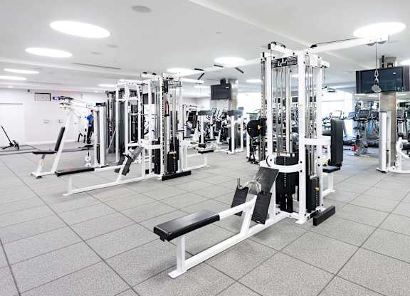 Fitness center with modern weight training equipment at La Jolla Crossroads Apartments, San Diego, CA 92122