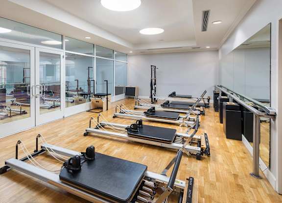 Pilates reformer studio with wood flooring at La Jolla Crossroads Apartments, San Diego, 92122