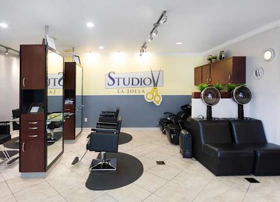 Hair salon studio with styling chairs and mirrors at La Jolla Crossroads Apartments, California