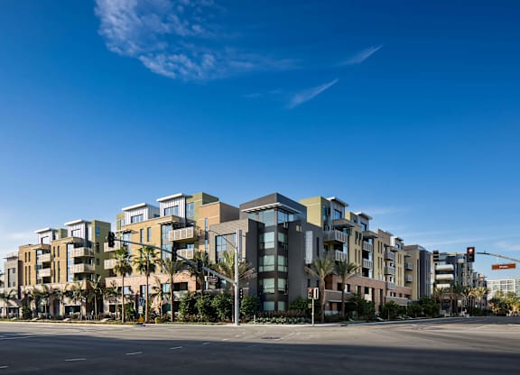 Modern apartment building exterior with contemporary architecture at Metropolis Apartments, IRVINE, CA