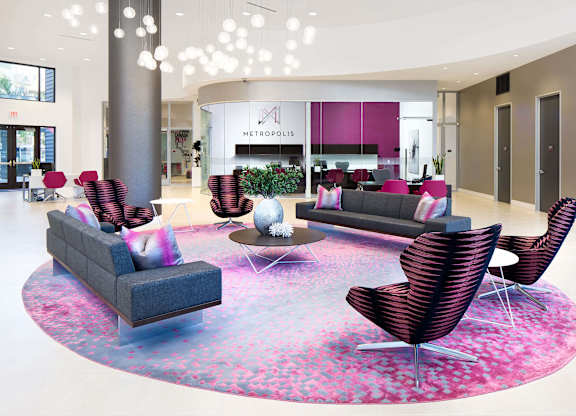 Modern lobby with contemporary seating and pendant lighting at Metropolis Apartments, California, 92614