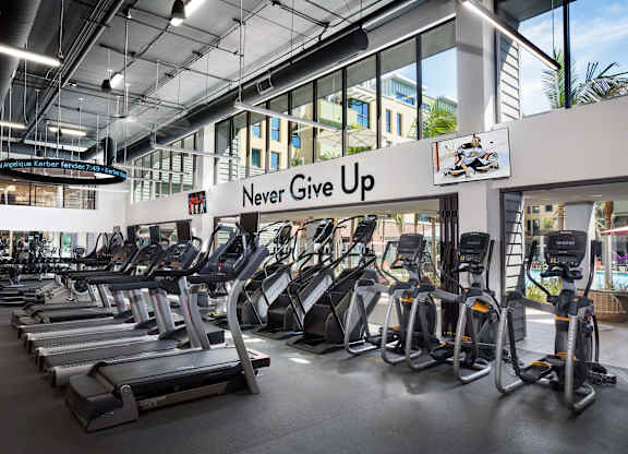 Fitness center with treadmills and cardio equipment at Metropolis Apartments, IRVINE, 92614