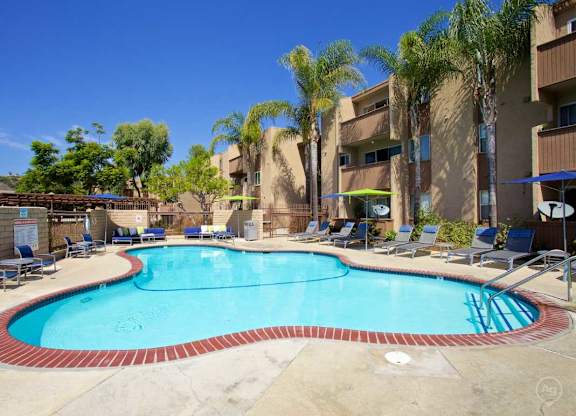 A large outdoor swimming pool at Pacific Bay Club Apartments, San Diego