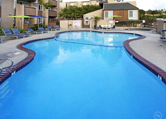 Blue Cool Swimming Pool at Pacific Bay Club Apartments, California, 92117