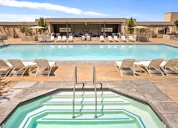 Pool deck with spa and covered cabana area at Casa Mira View Apartments, California, 92126
