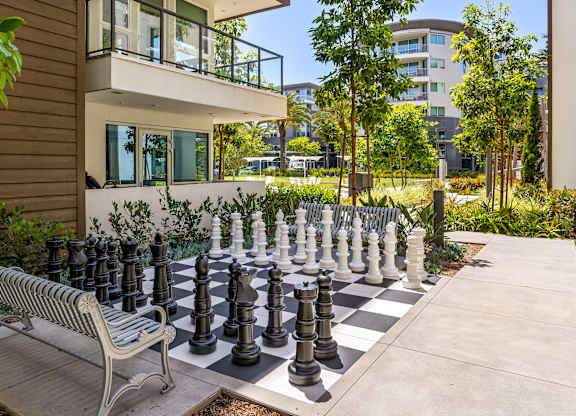 Outdoor giant chess set with bench seating at Elements Apartments, Irvine, CA 92612