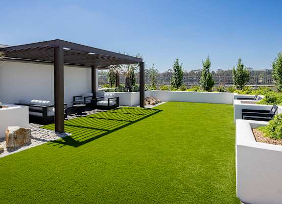 Zen Garden with lounge seating under a pergola.