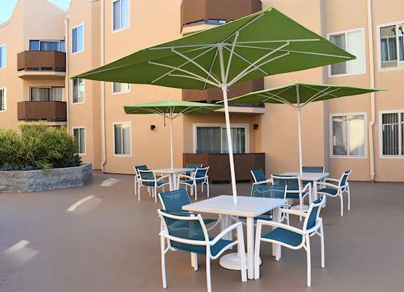 Patio with a Table and Chairs at Encino Palms Apartments, California, 91316