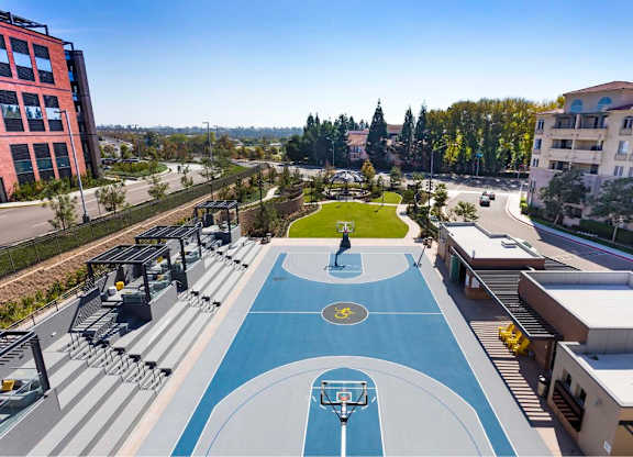 Full size basketball court with pergola and park views at 360 Luxury Apartments, San Diego, 92122