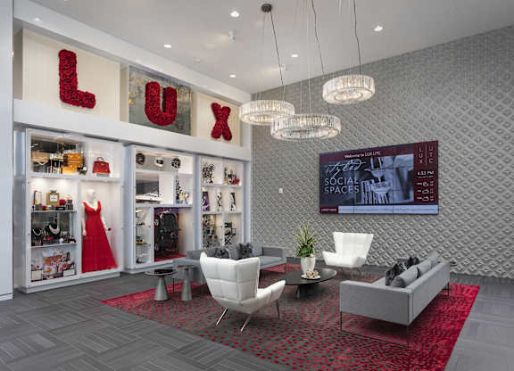 Contemporary lobby lounge with luxury boutique display at LUX by Garden* Apartments, San Diego, California