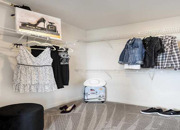 Walk-in closet with wire shelving system at LUX by Garden* Apartments, San Diego