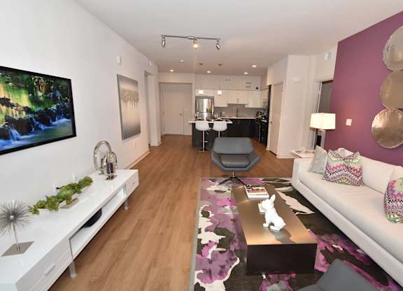 Living Room With Kitchen Area at Metropolis Apartments, IRVINE