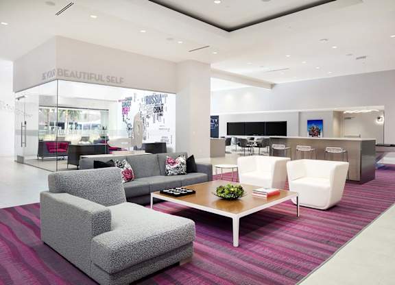 Stylish lobby with contemporary seating and workspace at Metropolis Apartments, IRVINE, 92614