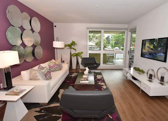 Living Area With TV at Metropolis Apartments, California, 92614