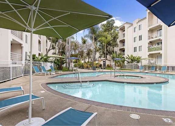 Pool With Relaxing Chairs at La Regencia Apartments, San Diego, 92122
