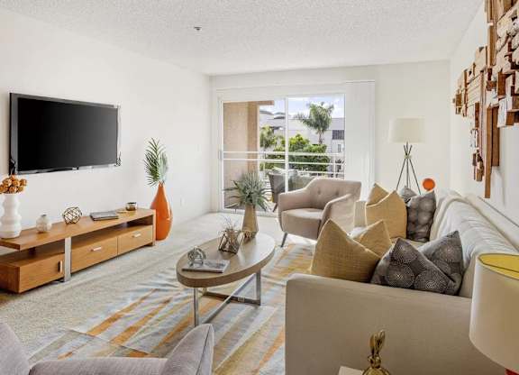 Living Room With TV at La Regencia Apartments, San Diego, CA