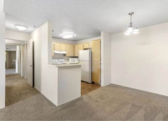 Dining And Kitchen at La Regencia Apartments, San Diego, California