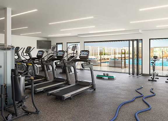 Fitness center with treadmills and strength equipment at Garden at 3Roots Apartments, San Diego, 92126