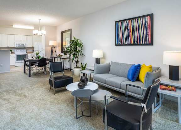 Living Room With Kitchen View at Towers at Costa Verde Apartments, San Diego, 92122