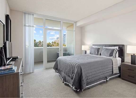 Bedroom With TV at Towers at Costa Verde Apartments, California