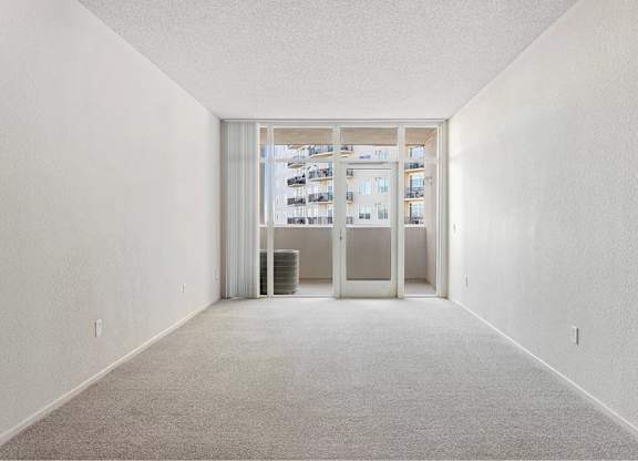 Carpeted Living Area at Towers at Costa Verde Apartments, San Diego, CA