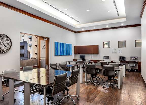 Business center with desks and office chairs at Costa Verde Village Apartments, San Diego