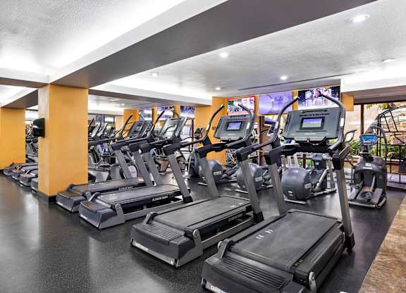 Fitness center with treadmills and cardio machines at Costa Verde Village Apartments, San Diego, CA 92122
