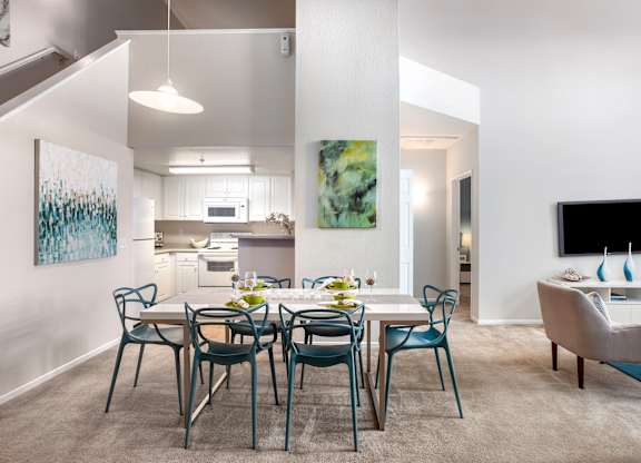 Open concept dining area with modern furnishings at Costa Verde Village Apartments, California