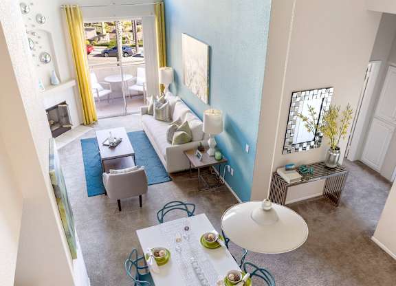 Aerial view of open concept living and dining space at Costa Verde Village Apartments, California