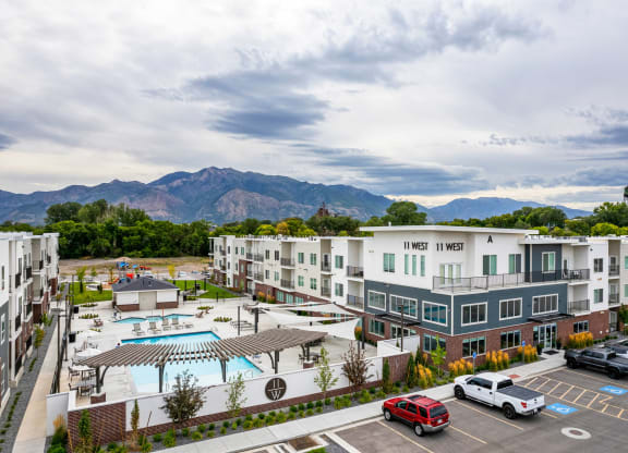 an aerial view of the hotel indigo with the mountains in the background