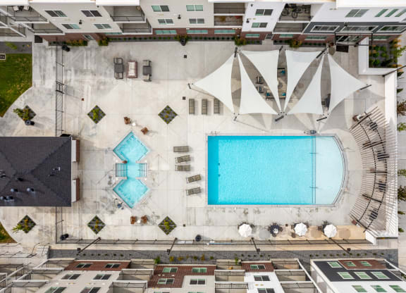 arial view of a swimming pool in the middle of a building
