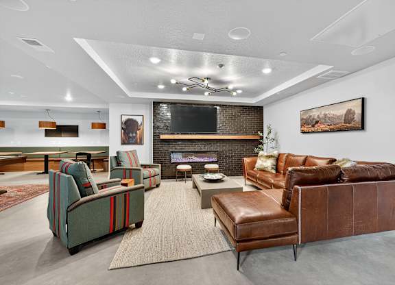 A living room with a fireplace and a couch.