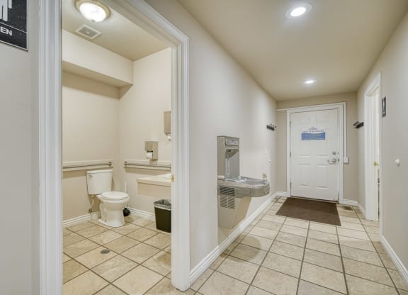 a bathroom with a toilet and a sink